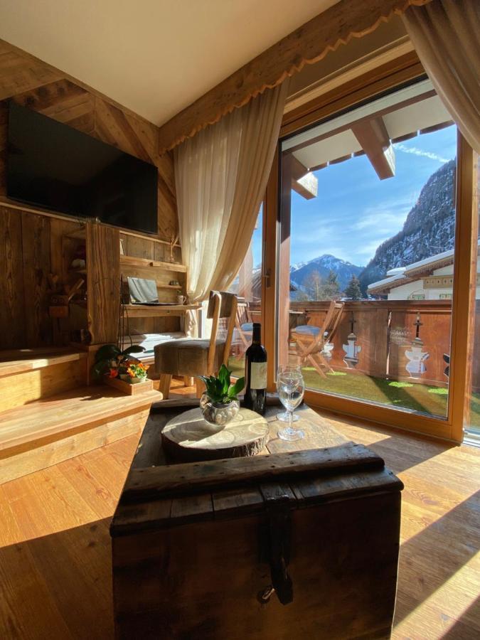 Calore Di Una Casa Di Montagna Кампителло-ди-Фасса Экстерьер фото