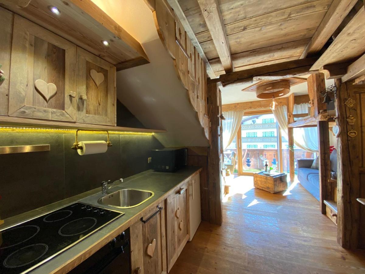 Calore Di Una Casa Di Montagna Кампителло-ди-Фасса Экстерьер фото